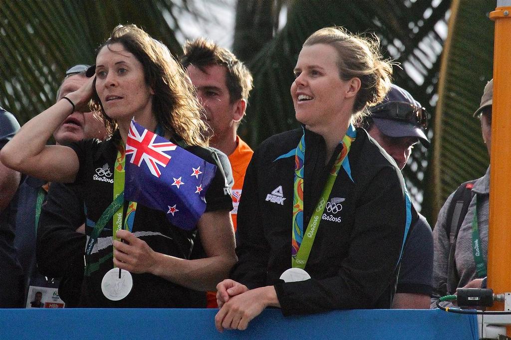 Silver medalists, Jo Aleh and Polly Powrie watch the 49er medal presentation - 2016 Olympic Regatta &copy; Richard Gladwell www.photosport.co.nz